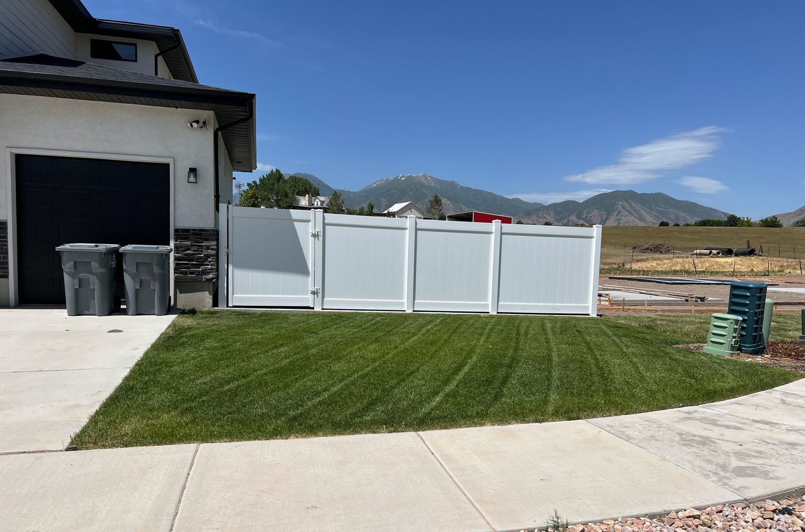 A freshly mowed lawn beside a Utah home
